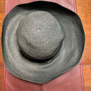 Wallaroo Black Wide-Brim Sun Protector Hat, Georgia style. Black 1.5” band, bow.